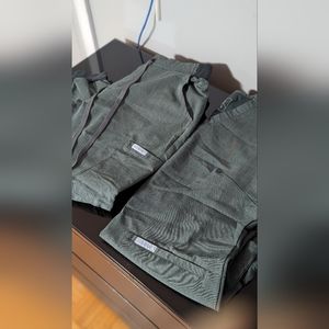 Cura scrubs in sage green, small top, medium bottom